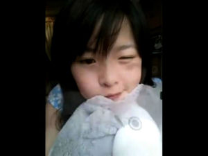 Cute chinese teen dancing on webcam